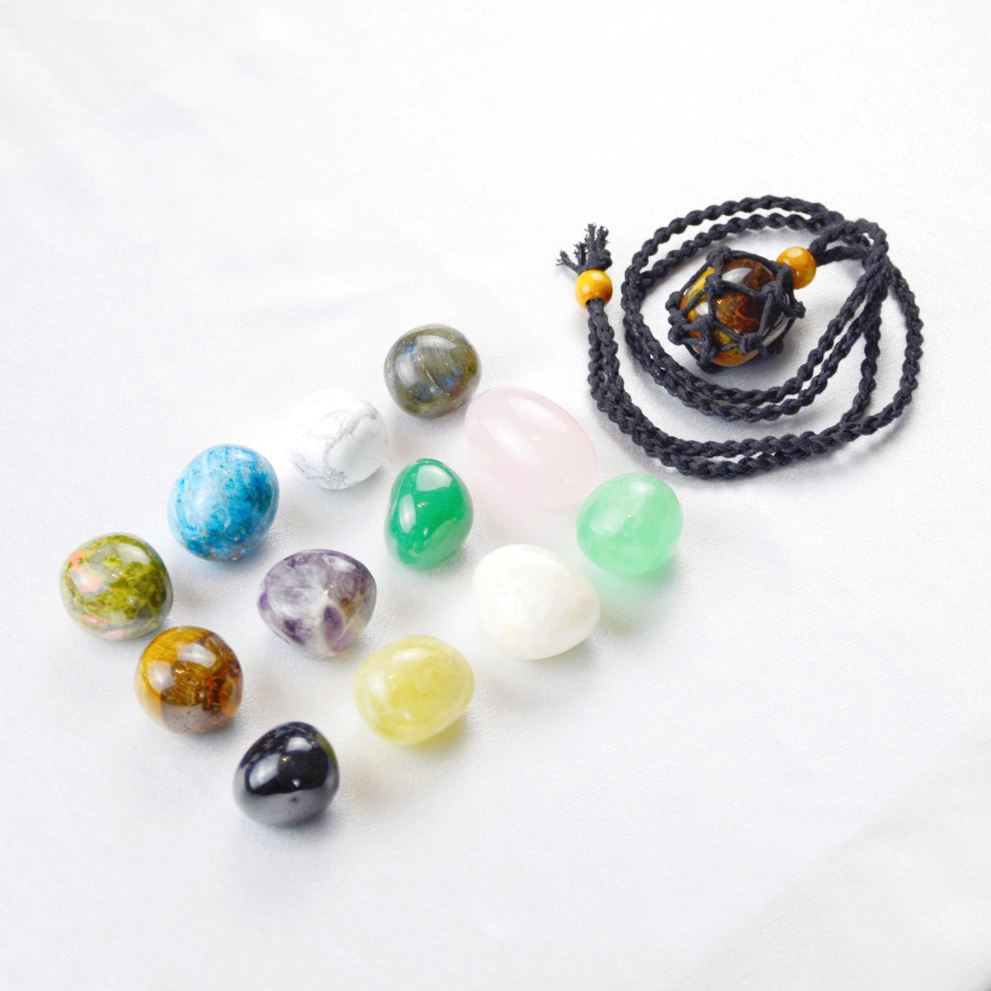 Natural Tiger’s Eye stone on an adjustable black cord
