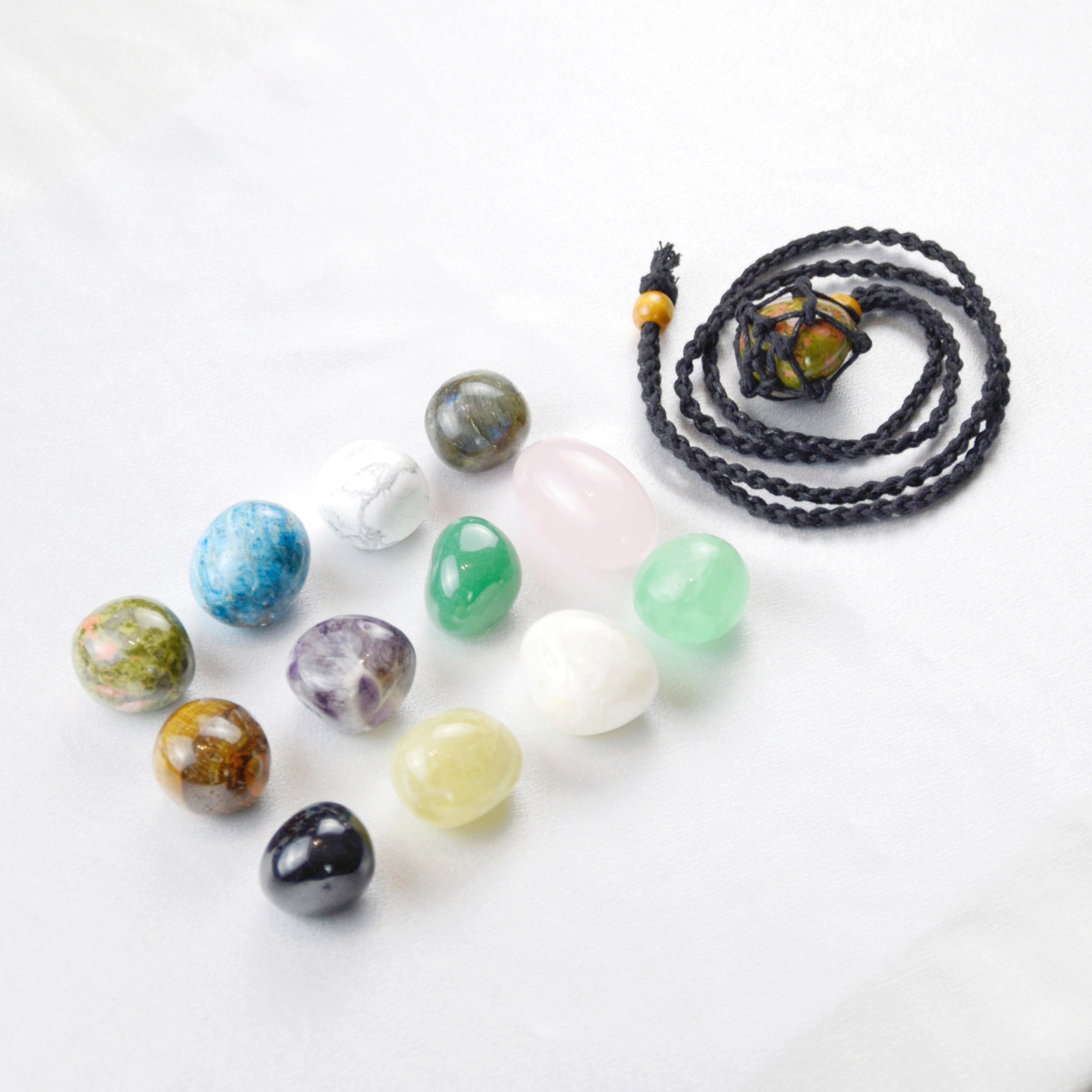 Natural Unakite stone on an adjustable black cord