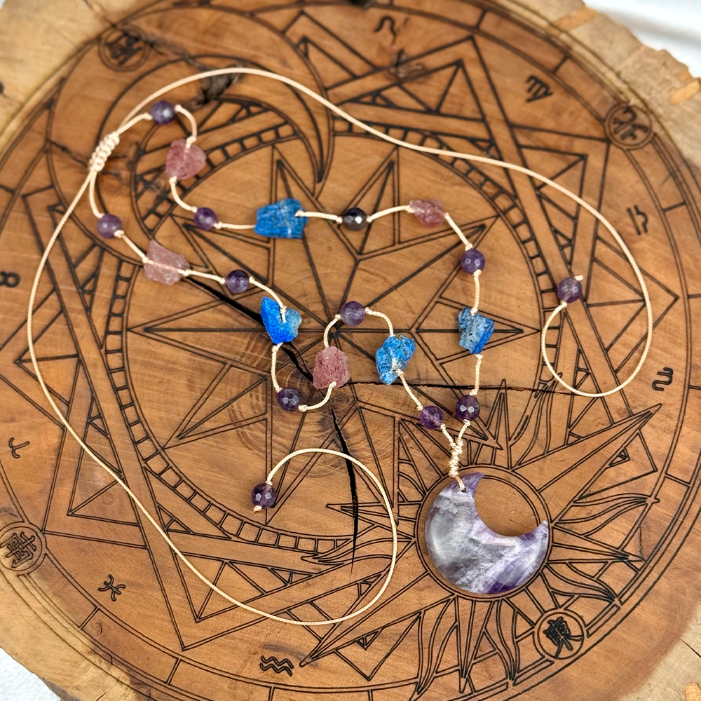 Woven Necklace with a Moon made of natural Amethyst, Lapis Lazuli, and Strawberry Quartz
