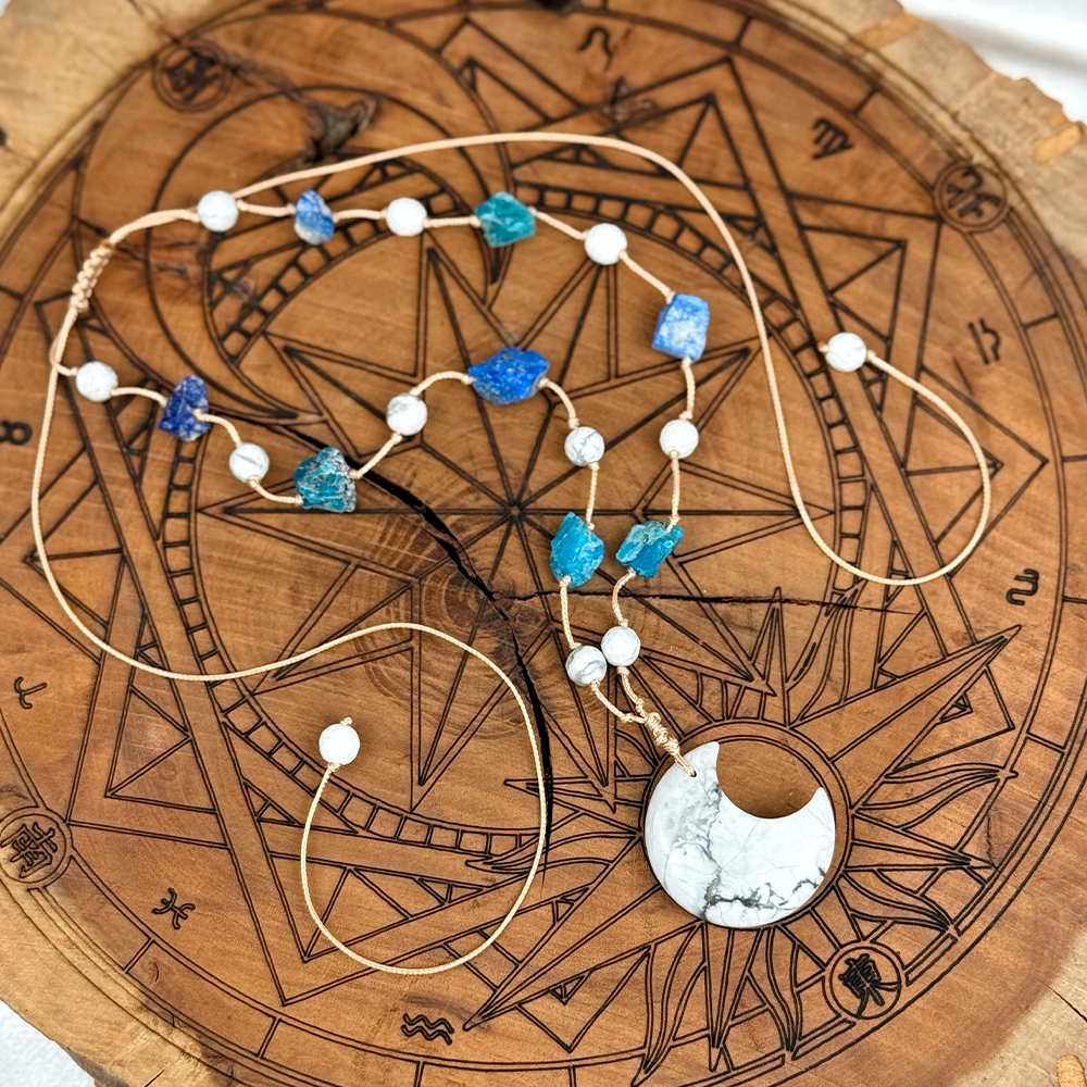Woven Necklace with a Moon made of natural Howlite, Lapis Lazuli, and Apatite