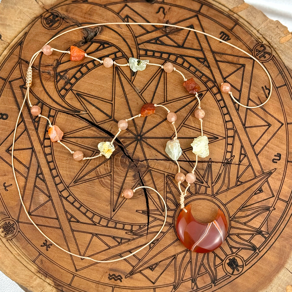 Woven Necklace with a Moon made of natural Carnelian, Sunstone, and Prehnite