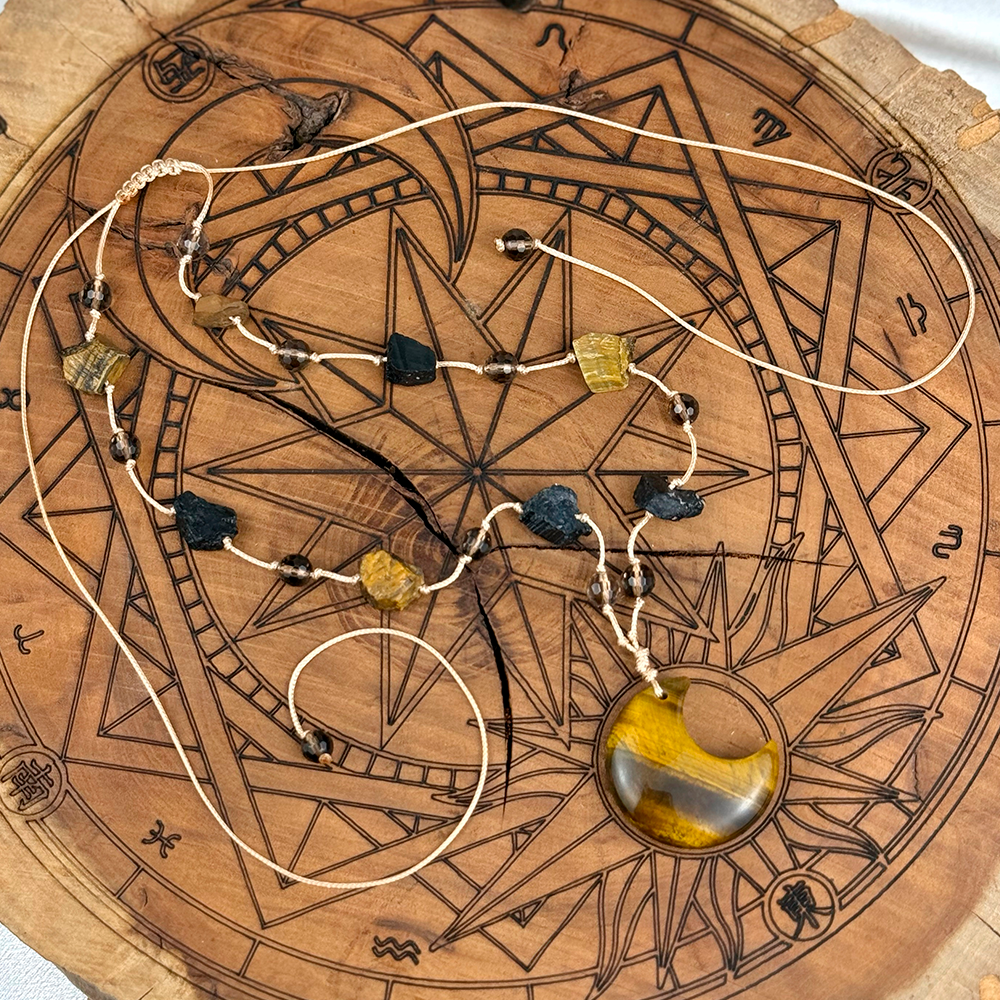 Woven Necklace with a Moon made of natural Tiger’s Eye, Tourmaline, and Smoky Quartz