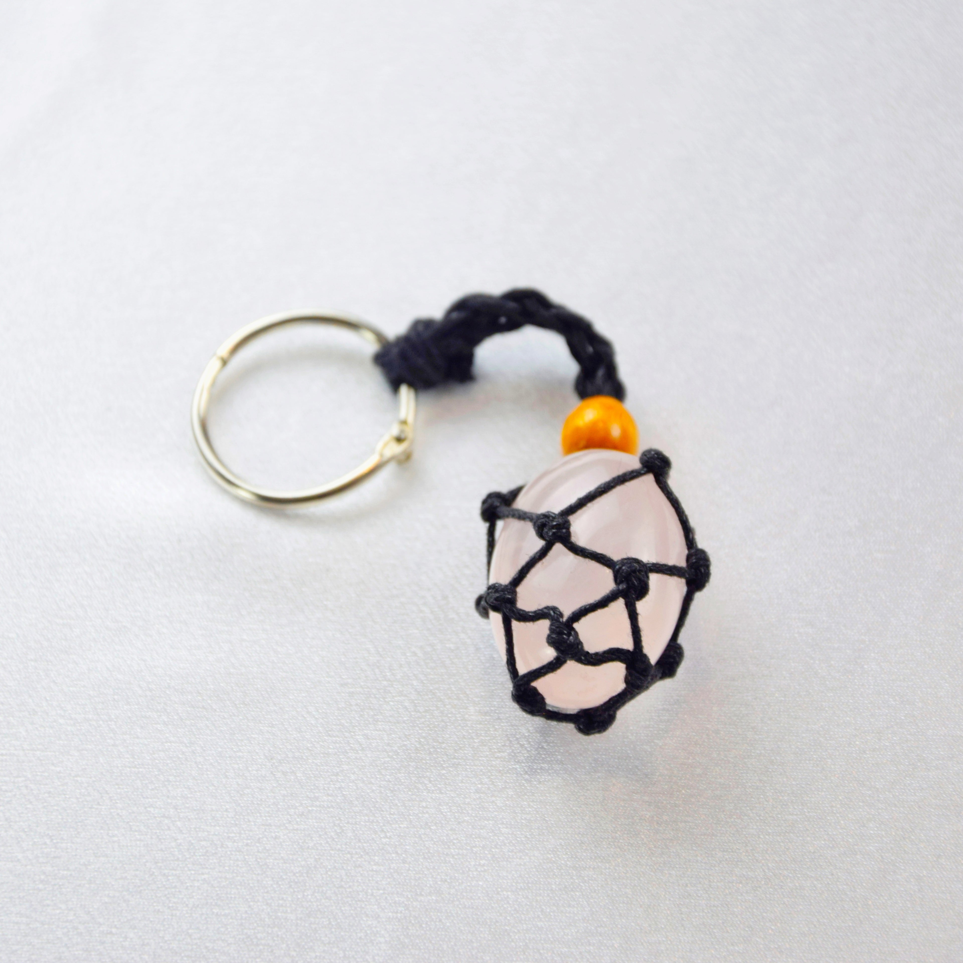 Keychain with a natural Rose Quartz stone on a cord