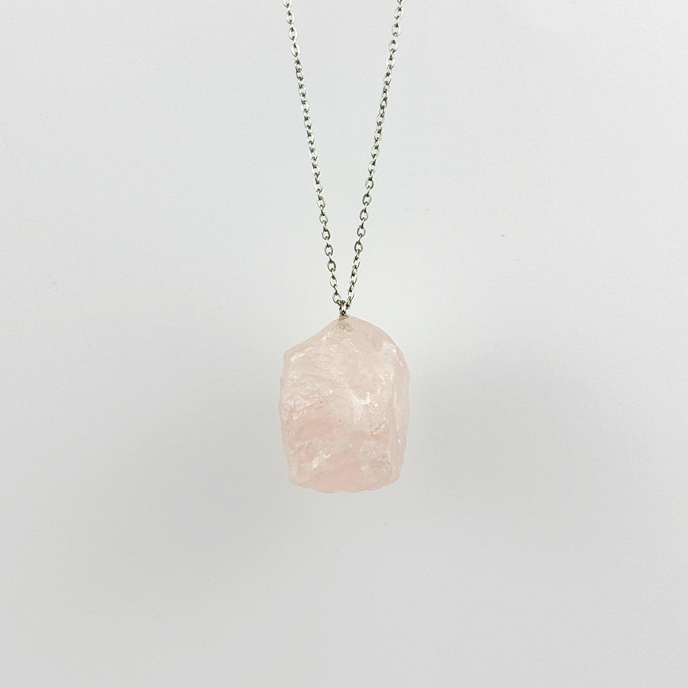 Raw Rose Quartz stone on a chain