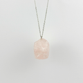 Raw Rose Quartz stone on a chain