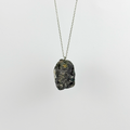 Raw Black Tourmaline stone on a chain