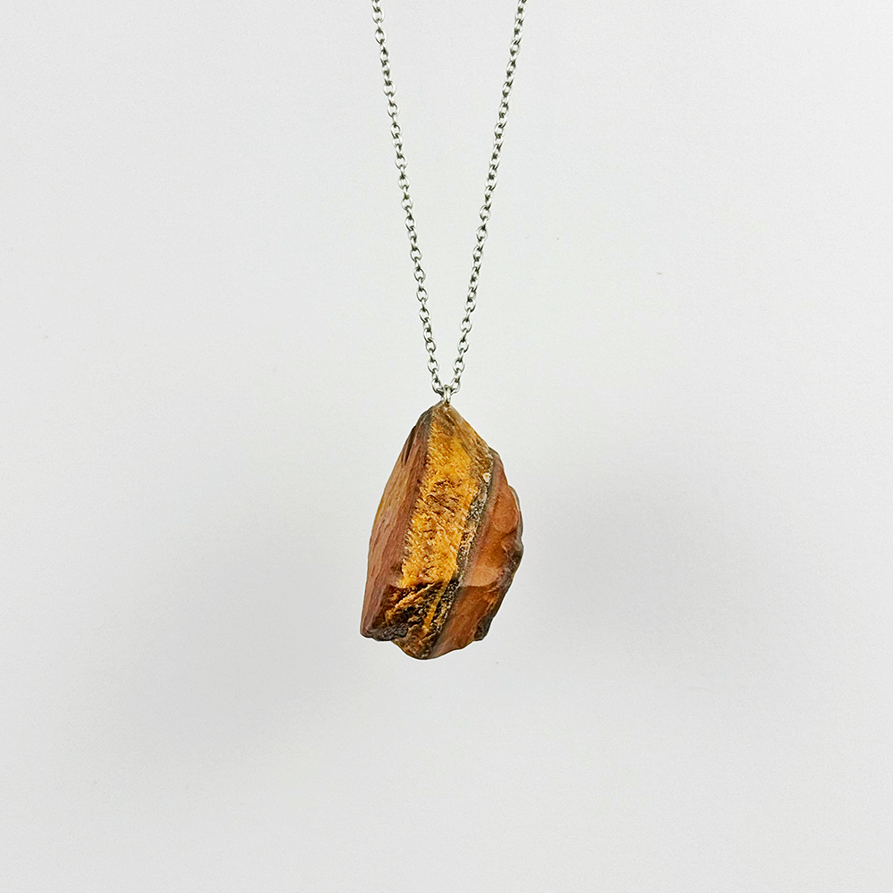 Raw Tiger’s Eye stone on a chain
