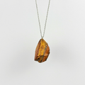 Raw Tiger’s Eye stone on a chain