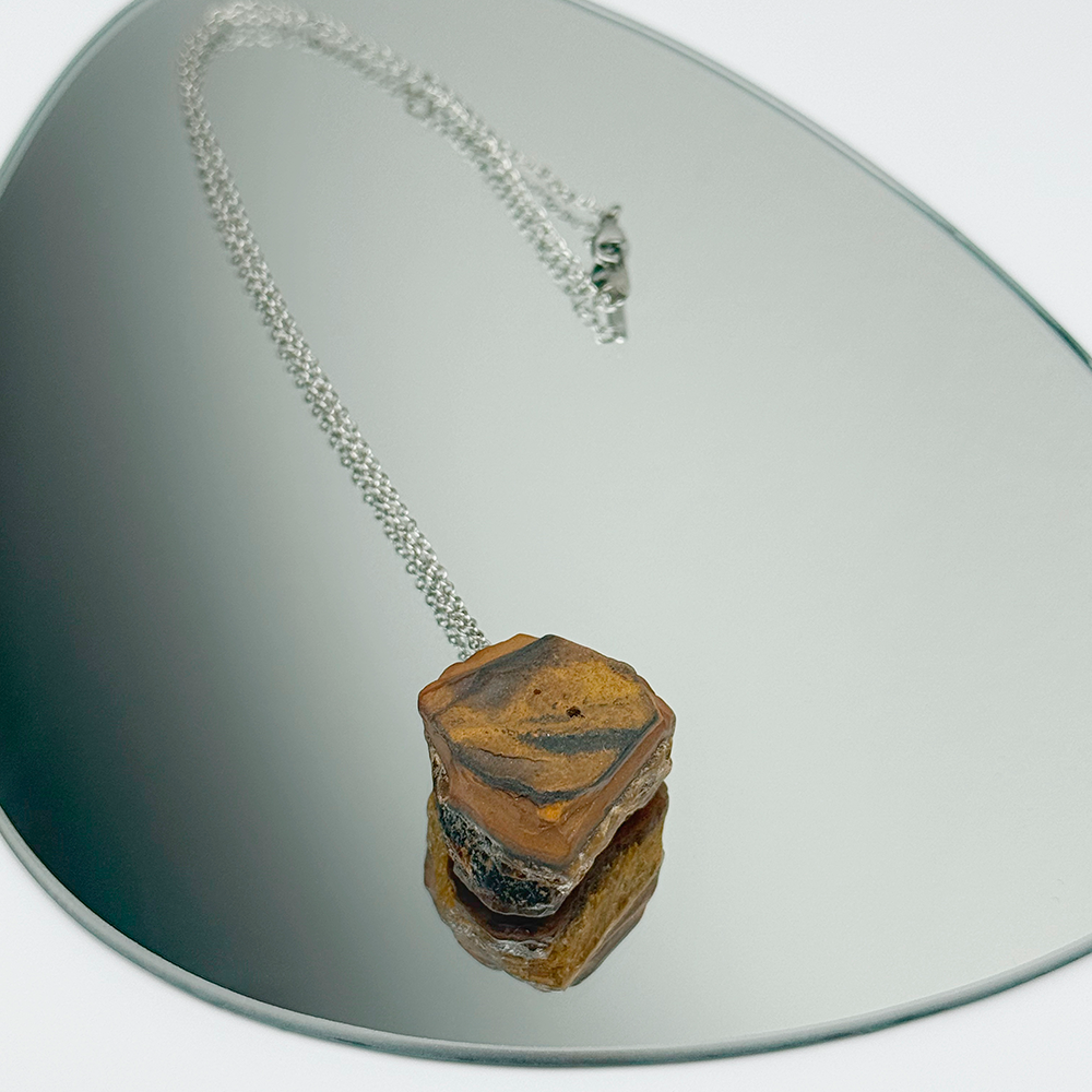 Raw Tiger’s Eye stone on a chain