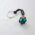 Keychain with a natural Turquoise stone on a cord