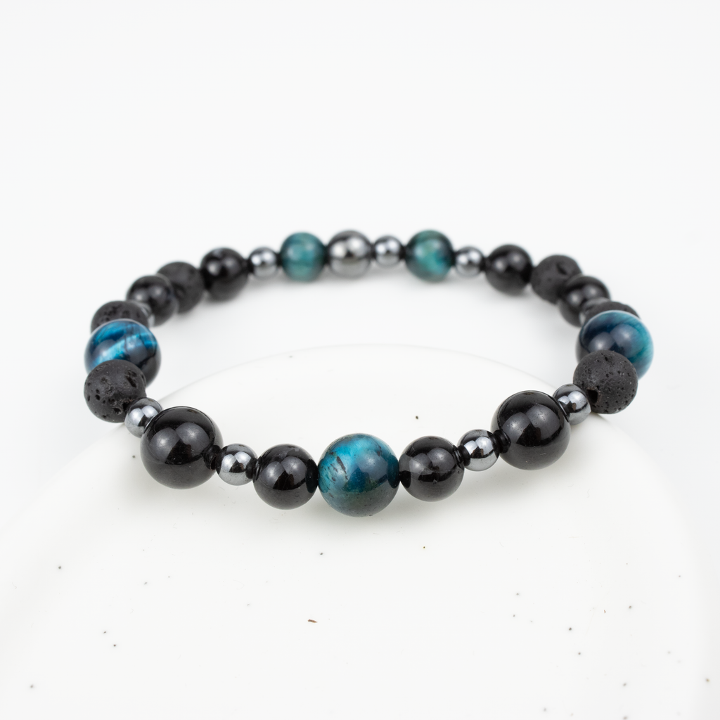 Bracelet made of natural Tourmaline, Lava Stone, and Tiger’s Eye stones on elastic thread