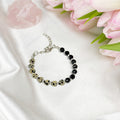 Black Tourmaline and Dalmatian Jasper bracelet on a chain